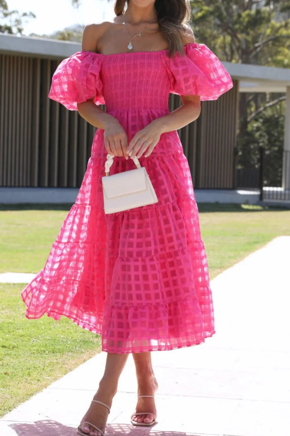 Off shoulder short puff sleeve midi dress by Shopiebay, featuring a stylish neckline and flowing fabric, perfect for summer wear.