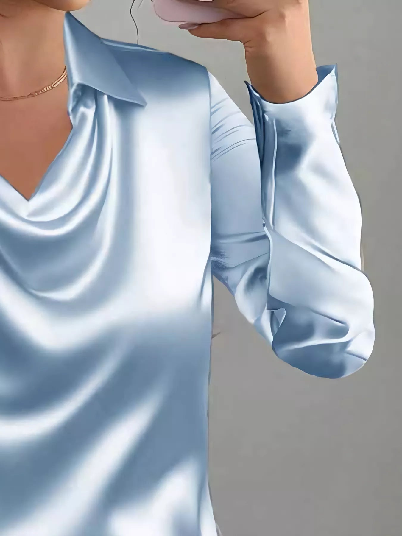 Satin collared long sleeve blouse by The Fashion Celestial with a smooth, shiny fabric and classic collar detail.