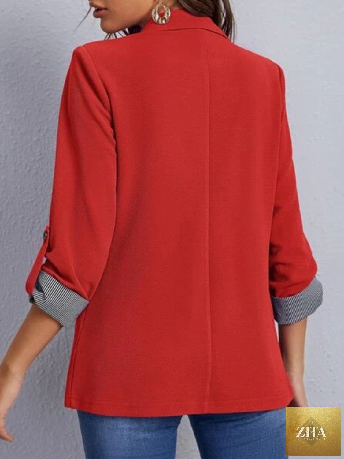 SITRA lapel collar blazer with roll-tab sleeves, tailored fit, and stylish design, shown in the image.