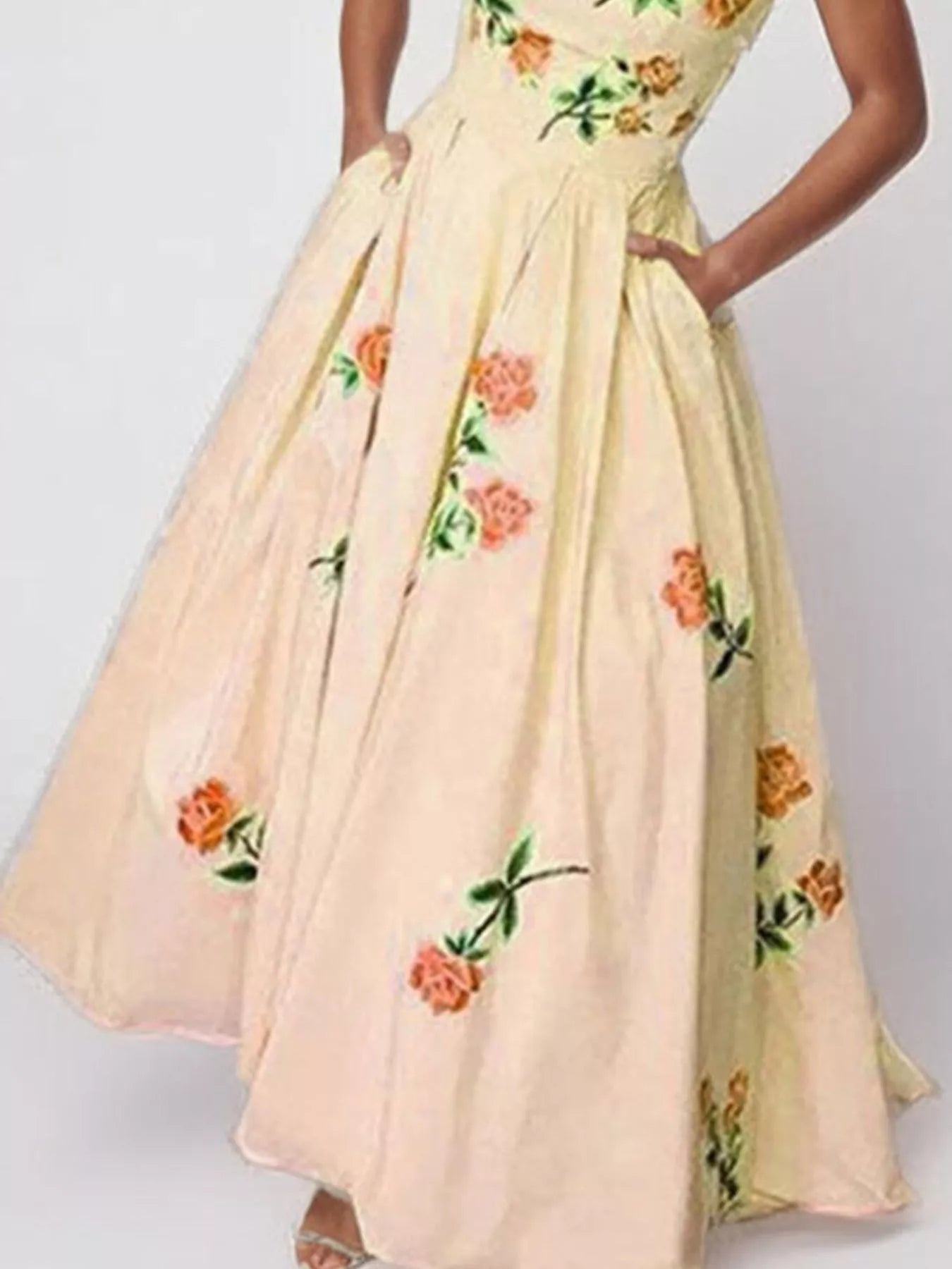 Floral print tube maxi dress by Shopiebay featuring a fitted bodice, flowing skirt, and vibrant floral pattern.