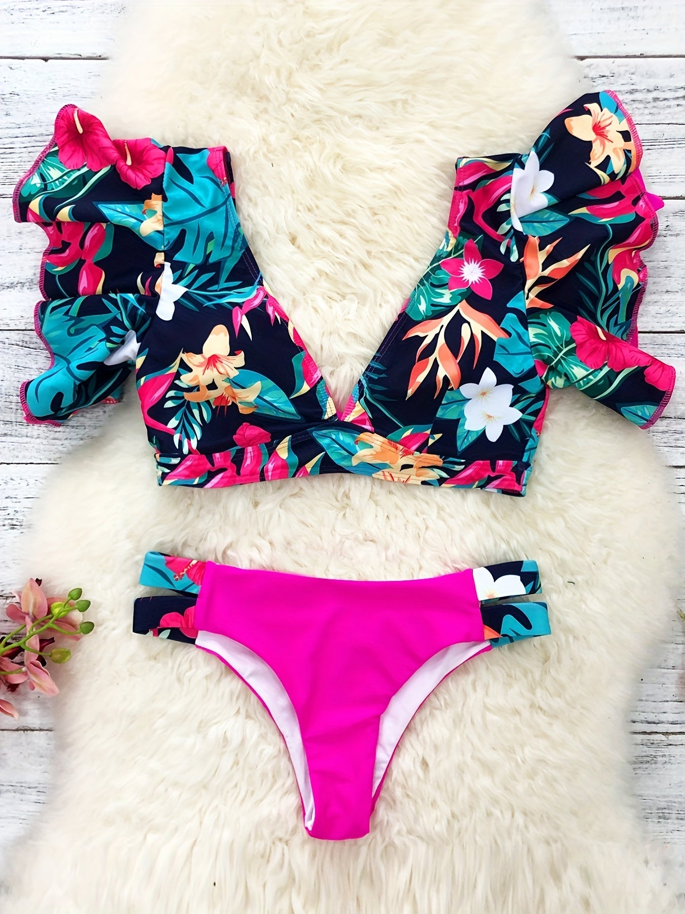 Stevvex Bloom Day Ruffle Bikini Set featuring a chic plant print, V-neck, tie-back, and high-stretch ruffle trim for women.
