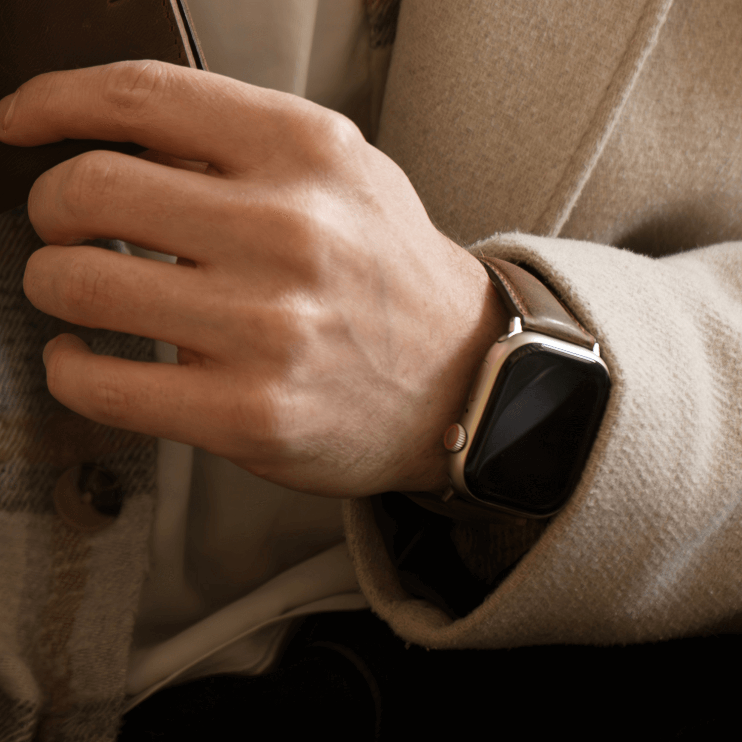 Luxury dark pink leather Apple Watch band with double wrap design from LEATHERE, featuring a stylish and comfortable fit.