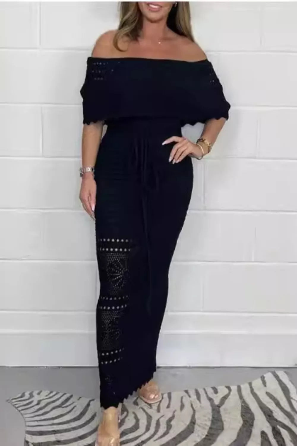 Crochet off-shoulder maxi dress by Shopiebay featuring intricate crochet details and a flowing silhouette for elegant summer wear.
