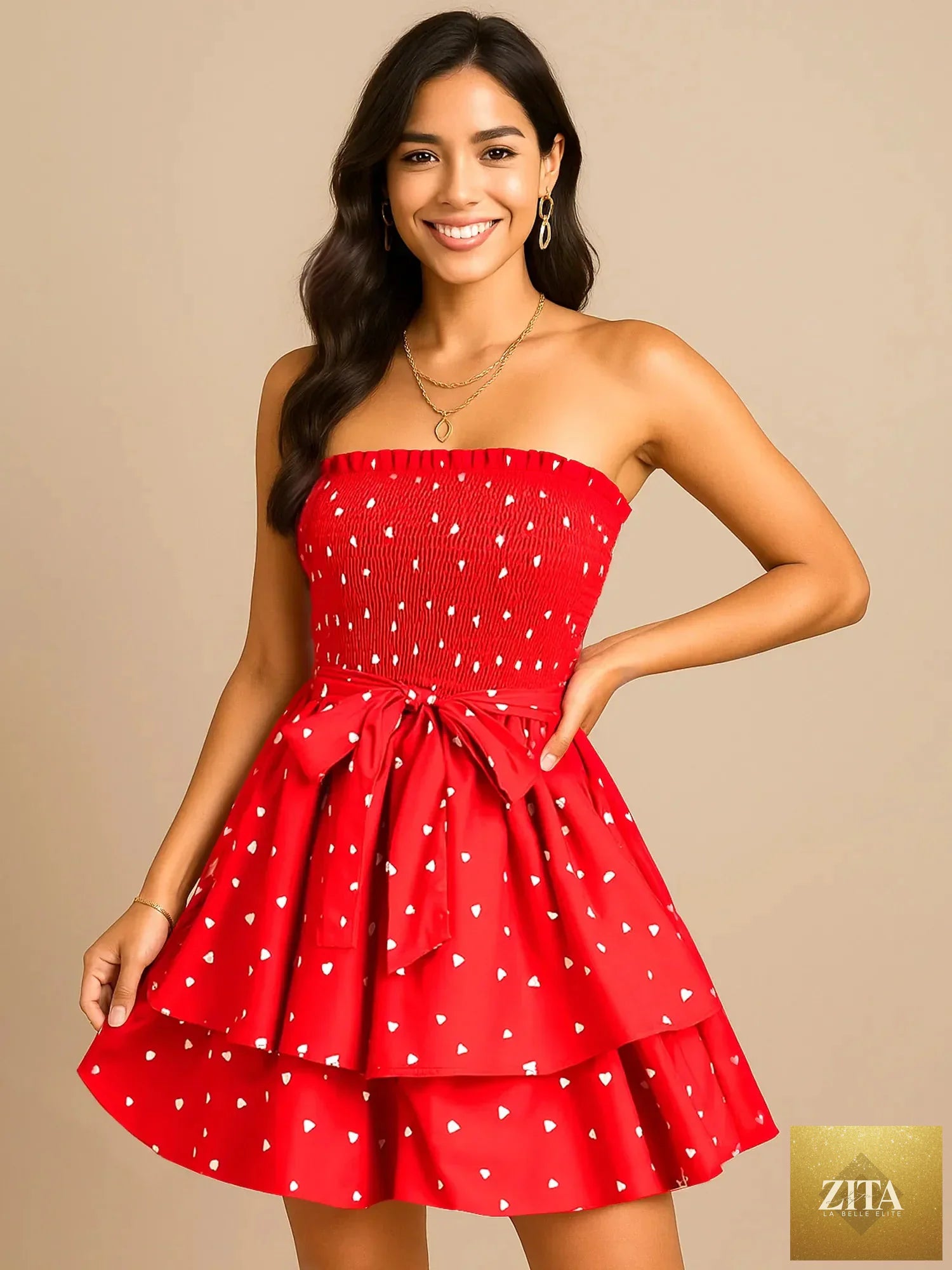 Smocked heart print tube dress by Shopiebay, featuring a fitted bodice and vibrant heart pattern, suitable for casual or summer wear.