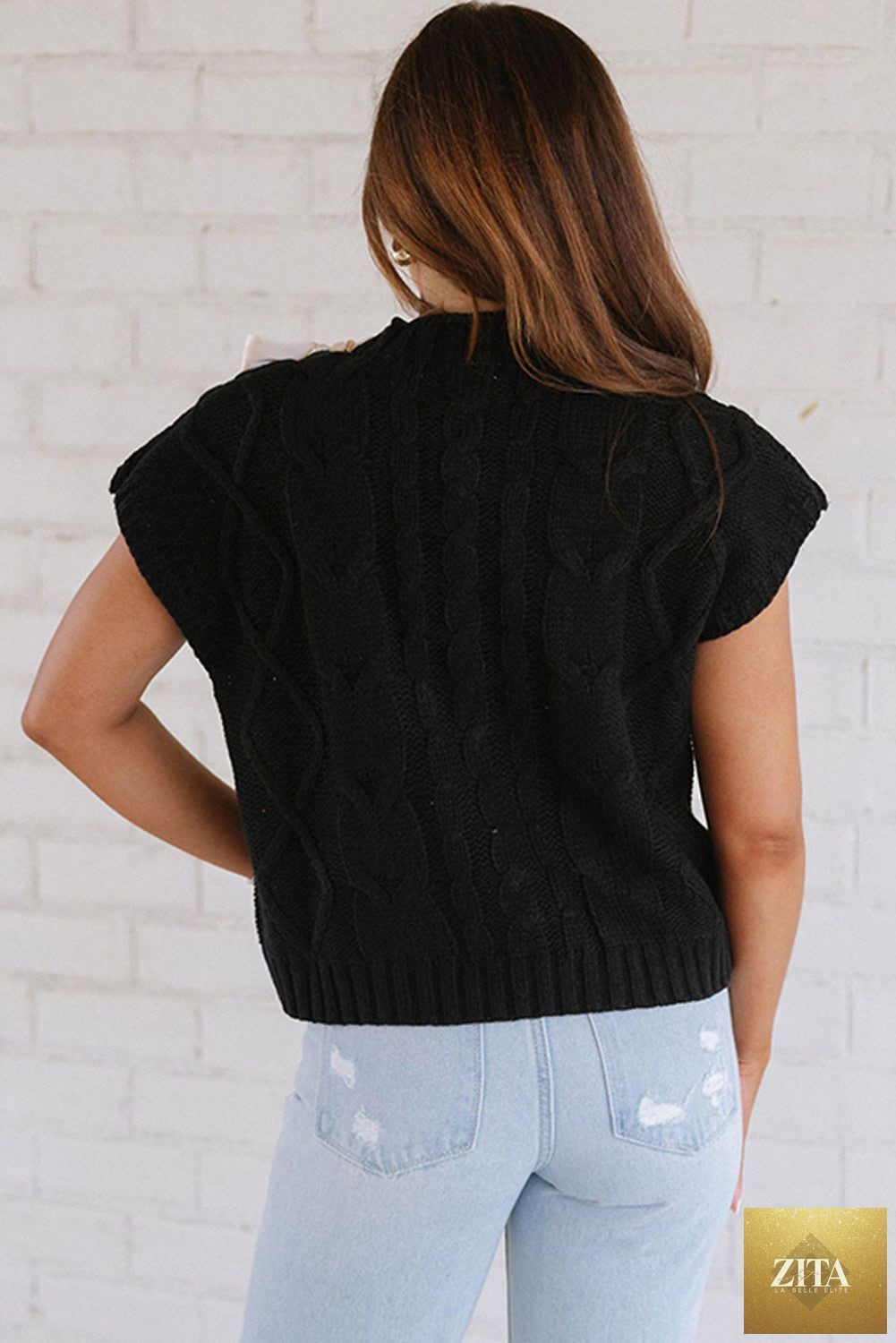 Black cable knit short sleeve sweater with colorblock satin bowknot from Unique Oils, featuring a cozy, stylish design.