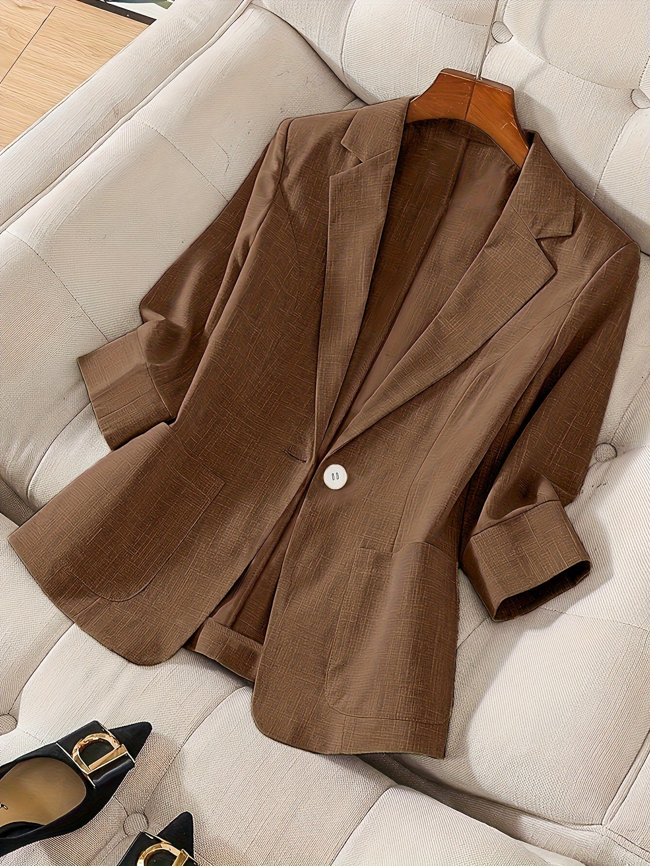 Women's casual blazer with three-quarter sleeves and a single button from FitiqueFit, shown on a neutral background.