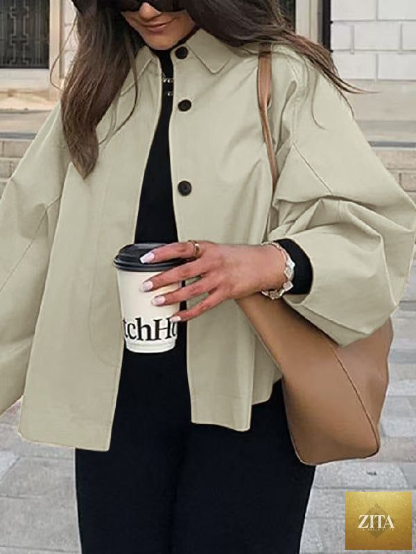 Women's French-style loose mid-length trench coat by FitiqueFit, showcasing a chic, lightweight workwear coat with classic collar and belted waist.