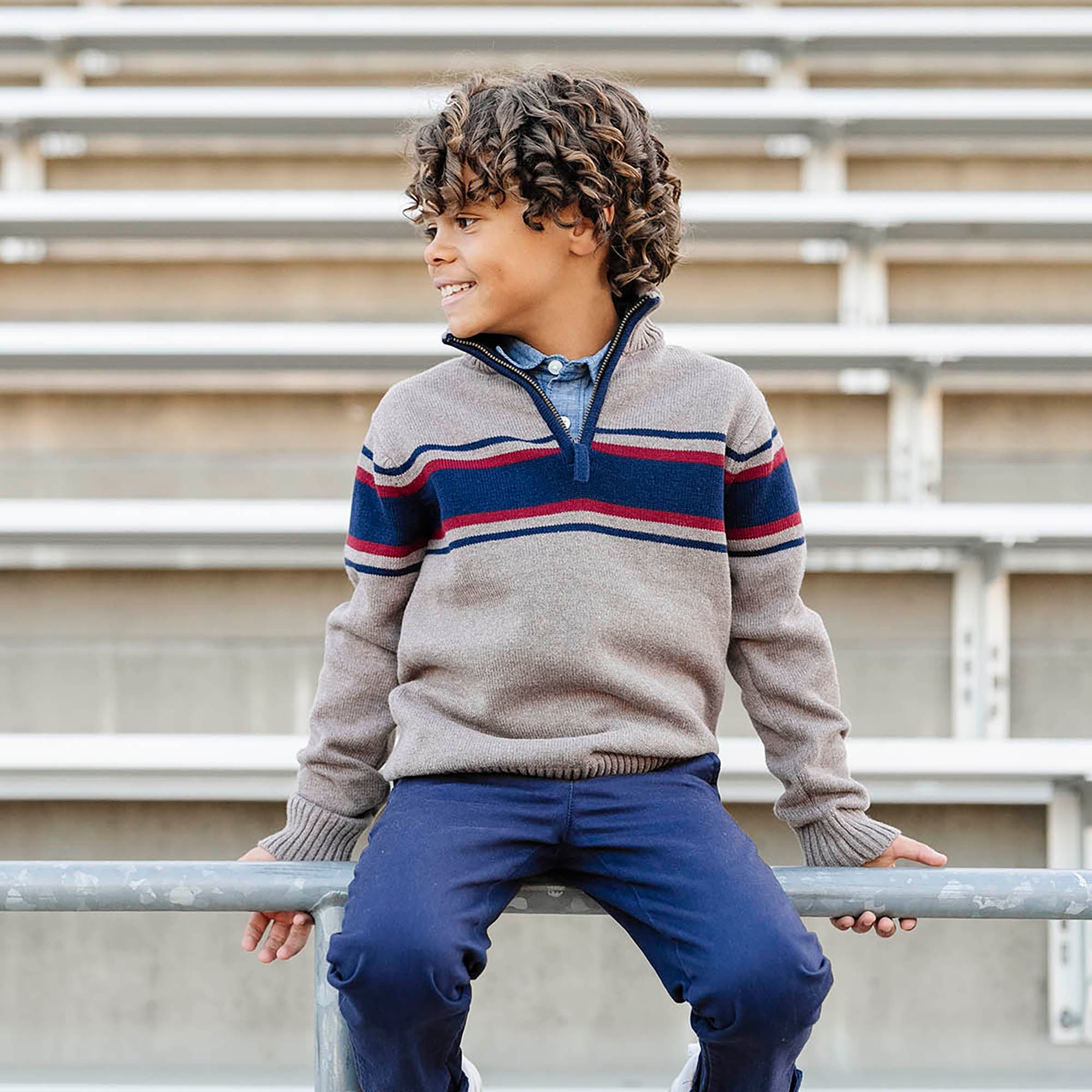 Hope & Henry organic half zip sweater worn casually, featuring a cozy fit and soft fabric in a lifestyle setting.