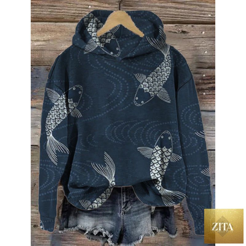 Women’s printed hooded long sleeve sweatshirt by FitiqueFit, showing a cozy hoodie with colorful floral print and front pocket detail.