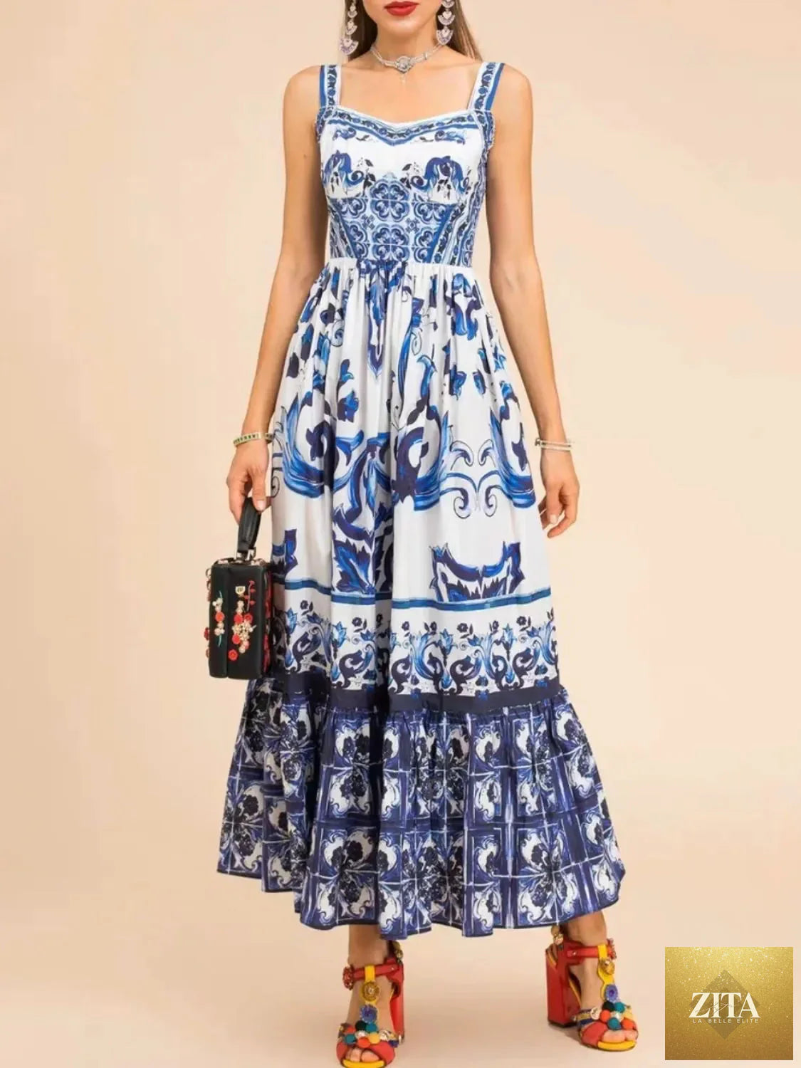 Smocked printed wide strap dress by Shopiebay, featuring a colorful floral pattern and flowing fabric for a stylish summer look.