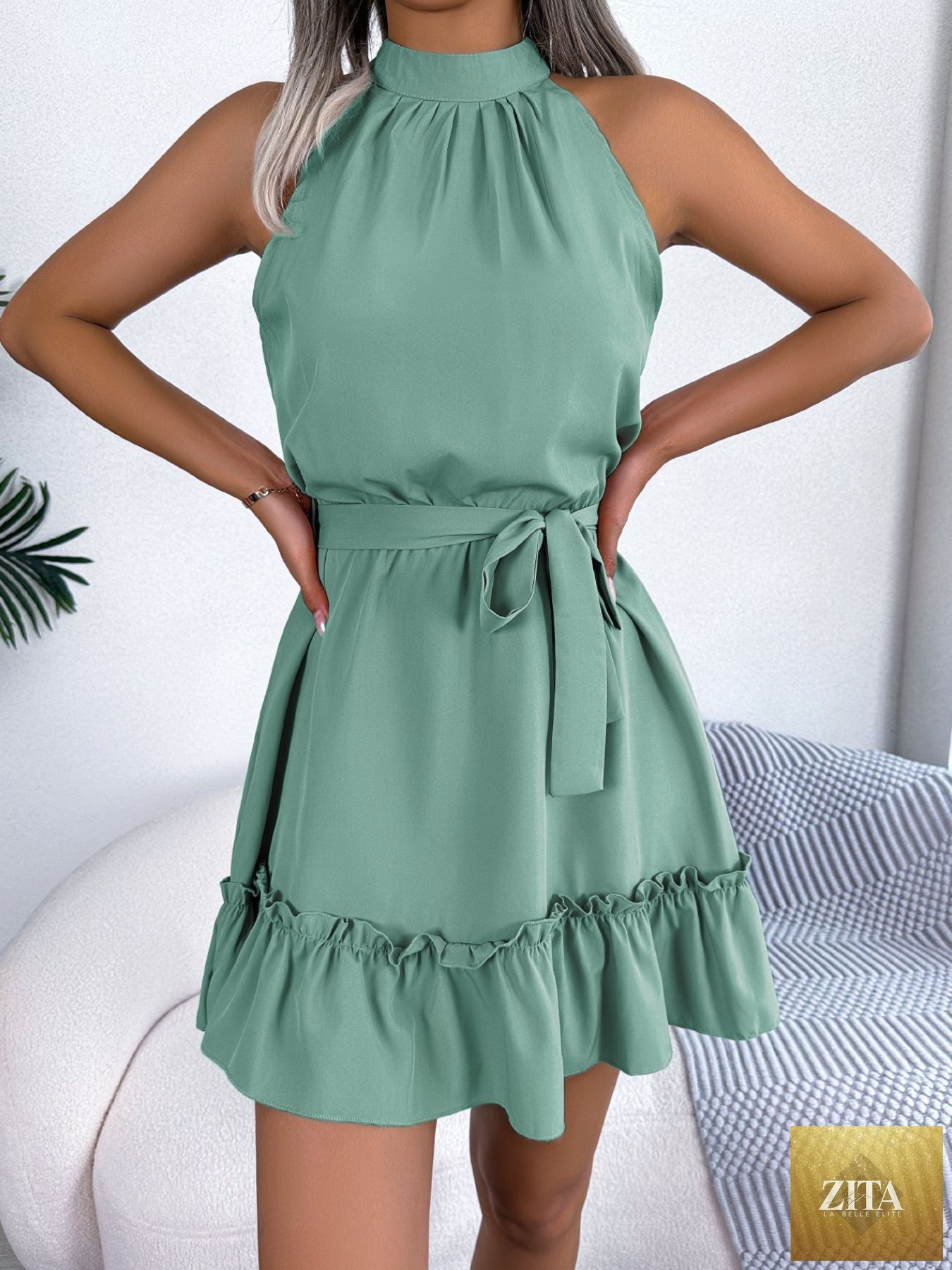 Halter neck ruffle hem A-line dress by Shopiebay, featuring a flowy silhouette and stylish ruffle details in a vibrant color.