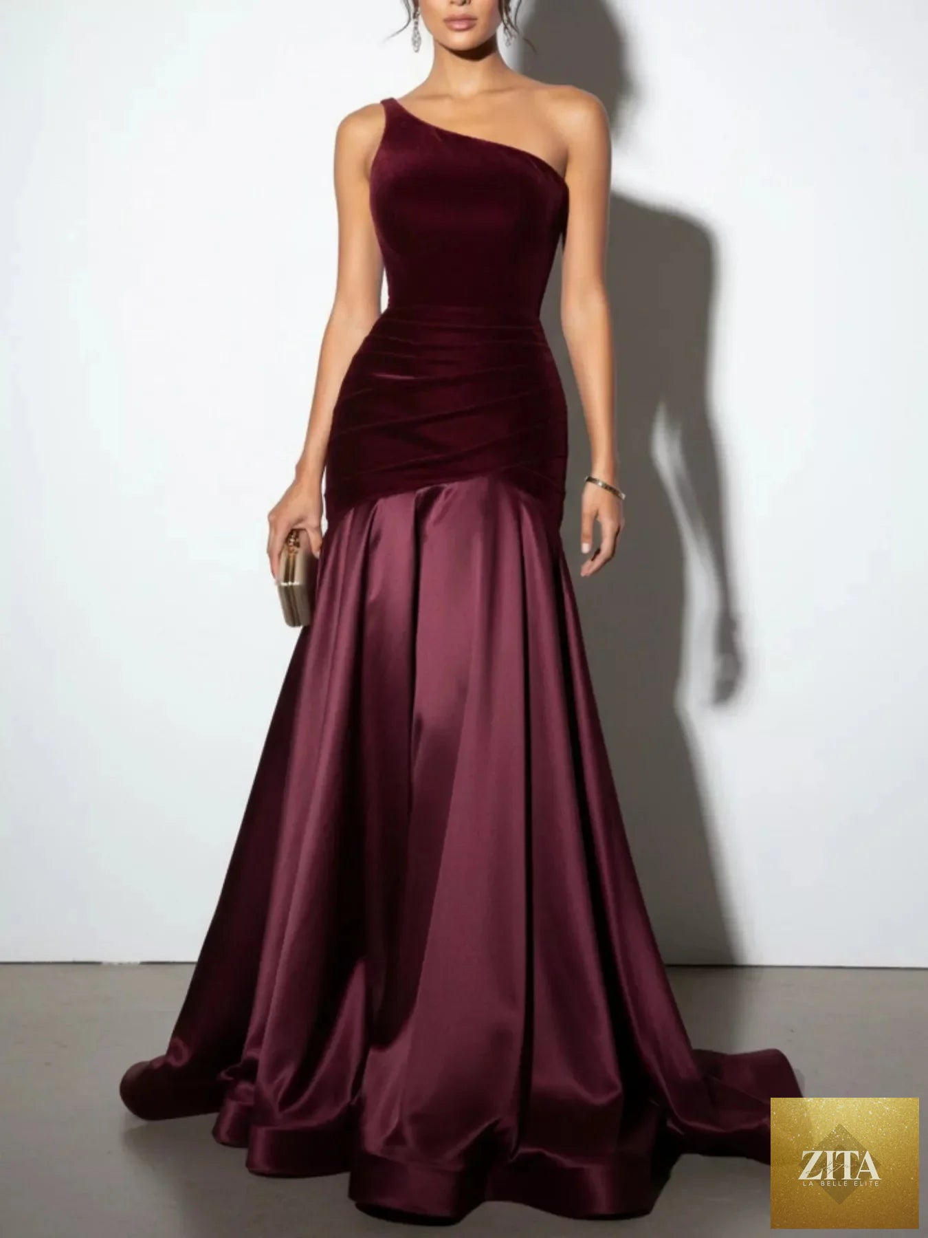Elegant single shoulder floor-length dress by Shopiebay featuring flowing fabric and a sleek, stylish design.