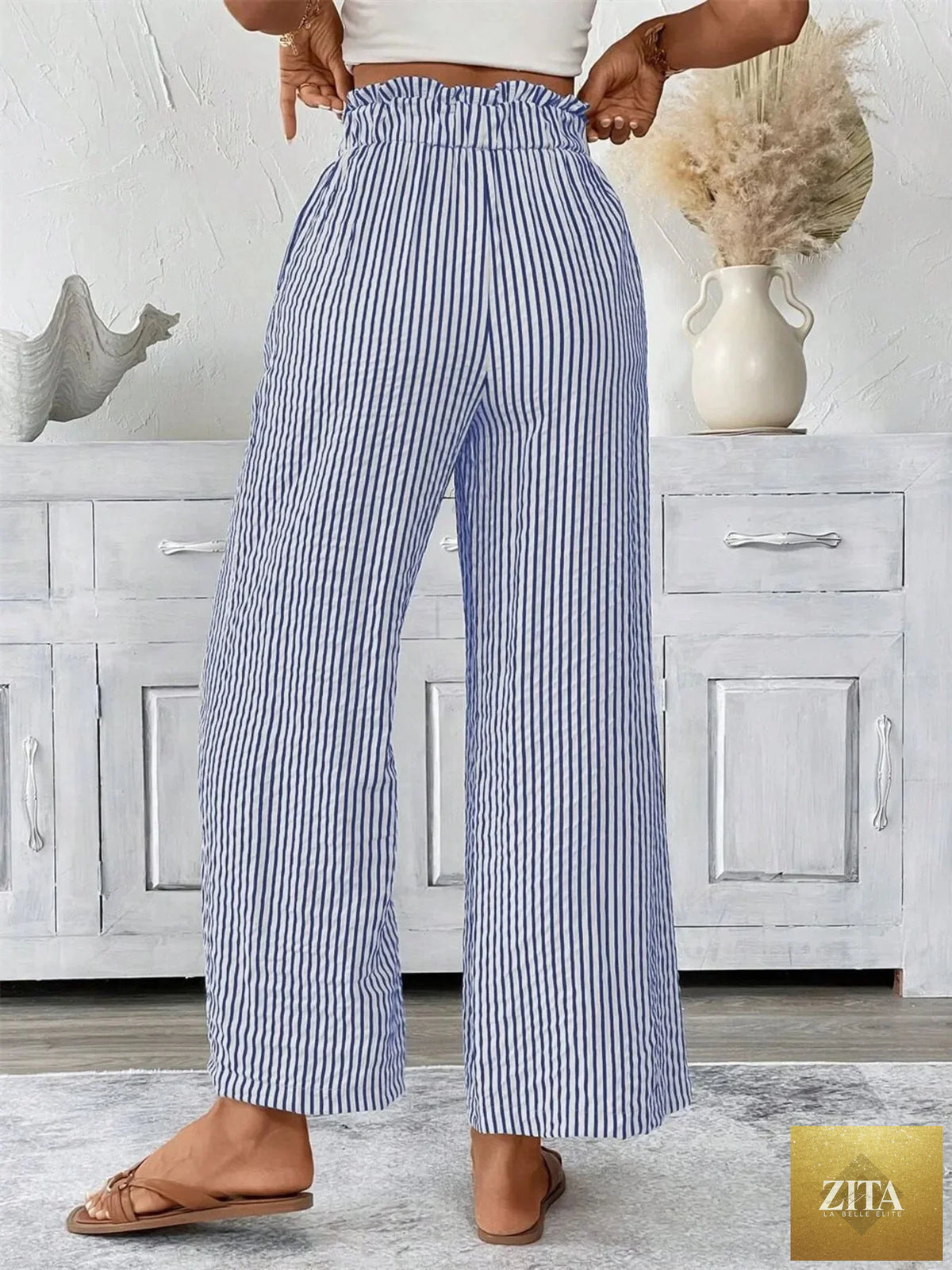 Plus size SITRA striped wide-leg paper bag pants with a full-length design and comfortable fit, featuring a stylish high waist.