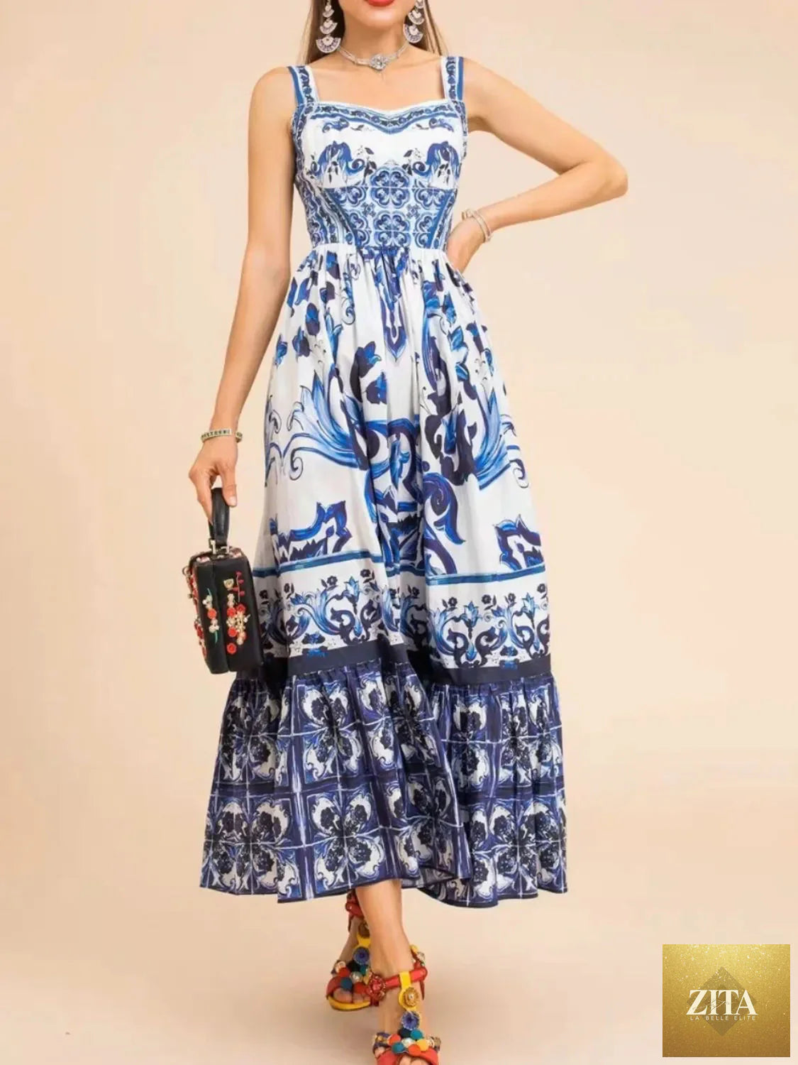 Smocked printed wide strap dress by Shopiebay featuring a flowy design and colorful floral pattern, perfect for casual summer wear.