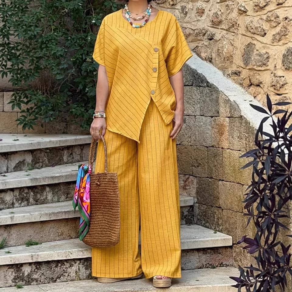 Casualwear striped shirt and loose pants set by FitiqueFit, featuring three-quarter sleeves and a relaxed fit.