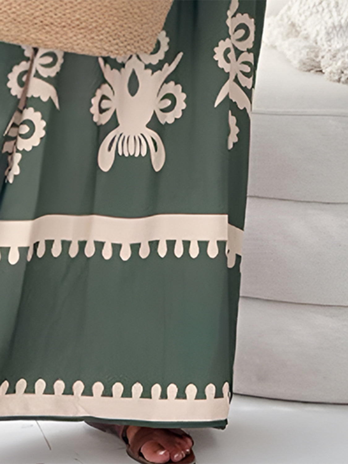 Stevvex sleeveless maxi dress with unique printed spaghetti straps, elegant summer style, flowing fabric, and vibrant design.