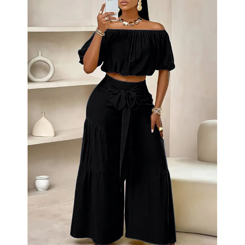 Casualwear high-waist flared pants and top two-piece set by FitiqueFit in multiple colors, size S to 2XL, seen on a model.