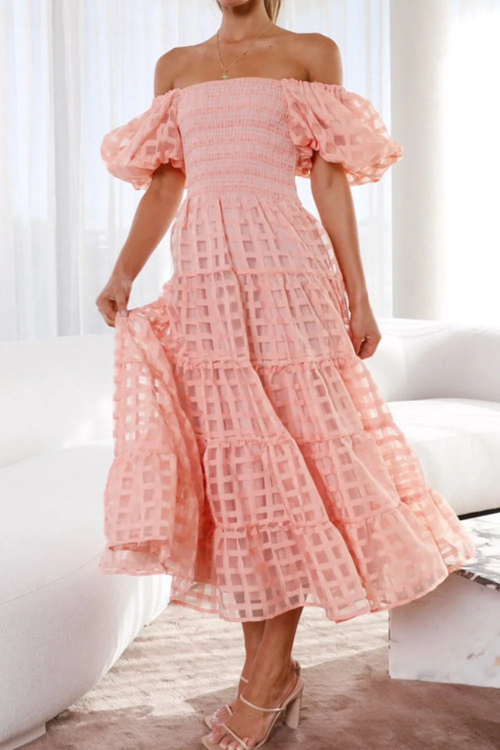 Off-shoulder short puff sleeve midi dress from Shopiebay, featuring a stylish design and flowing fabric, perfect for casual or dressy occasions.
