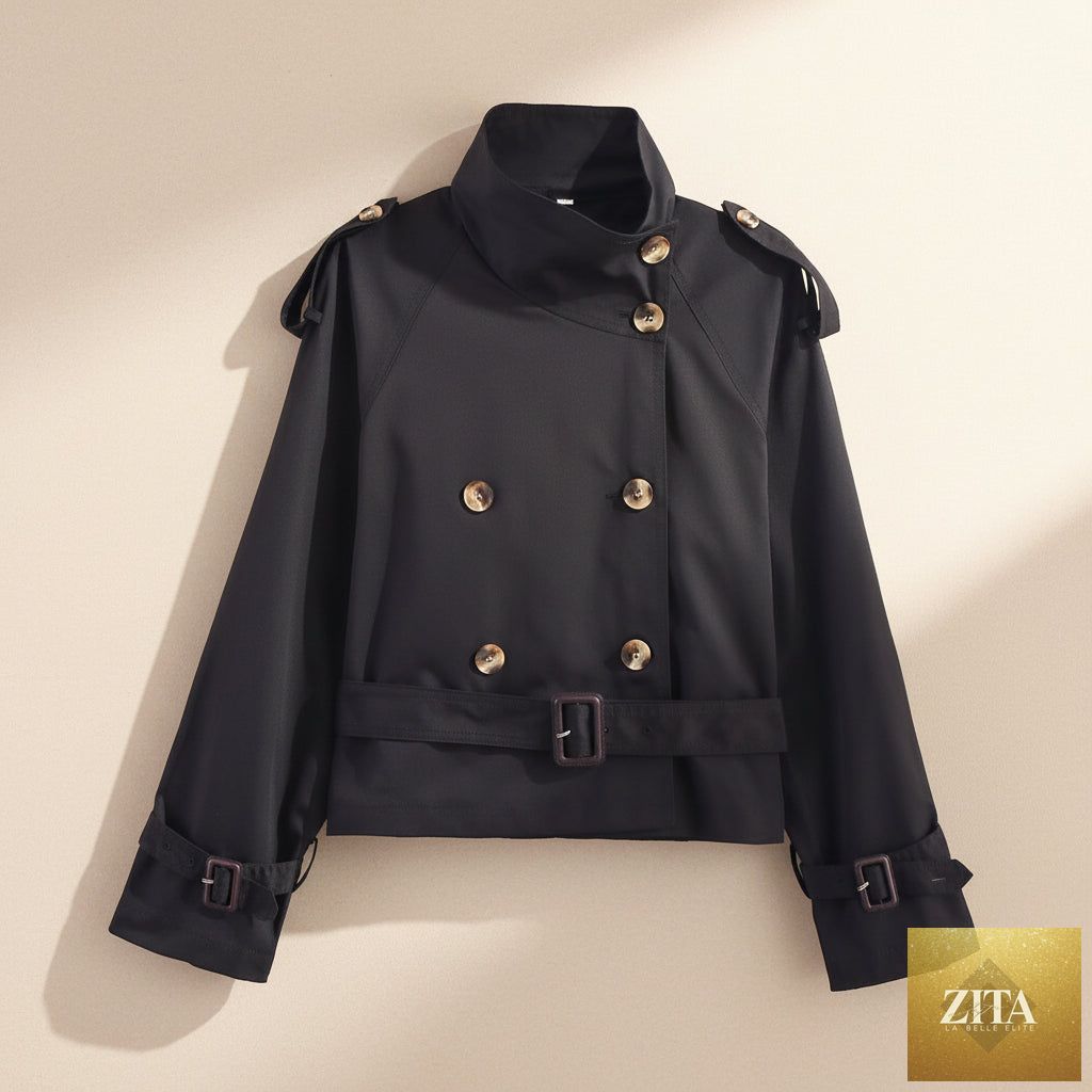 Women's FitiqueFit short trench coat with notch collar, belt buckle detail, lightweight jacket suitable for transitional weather.