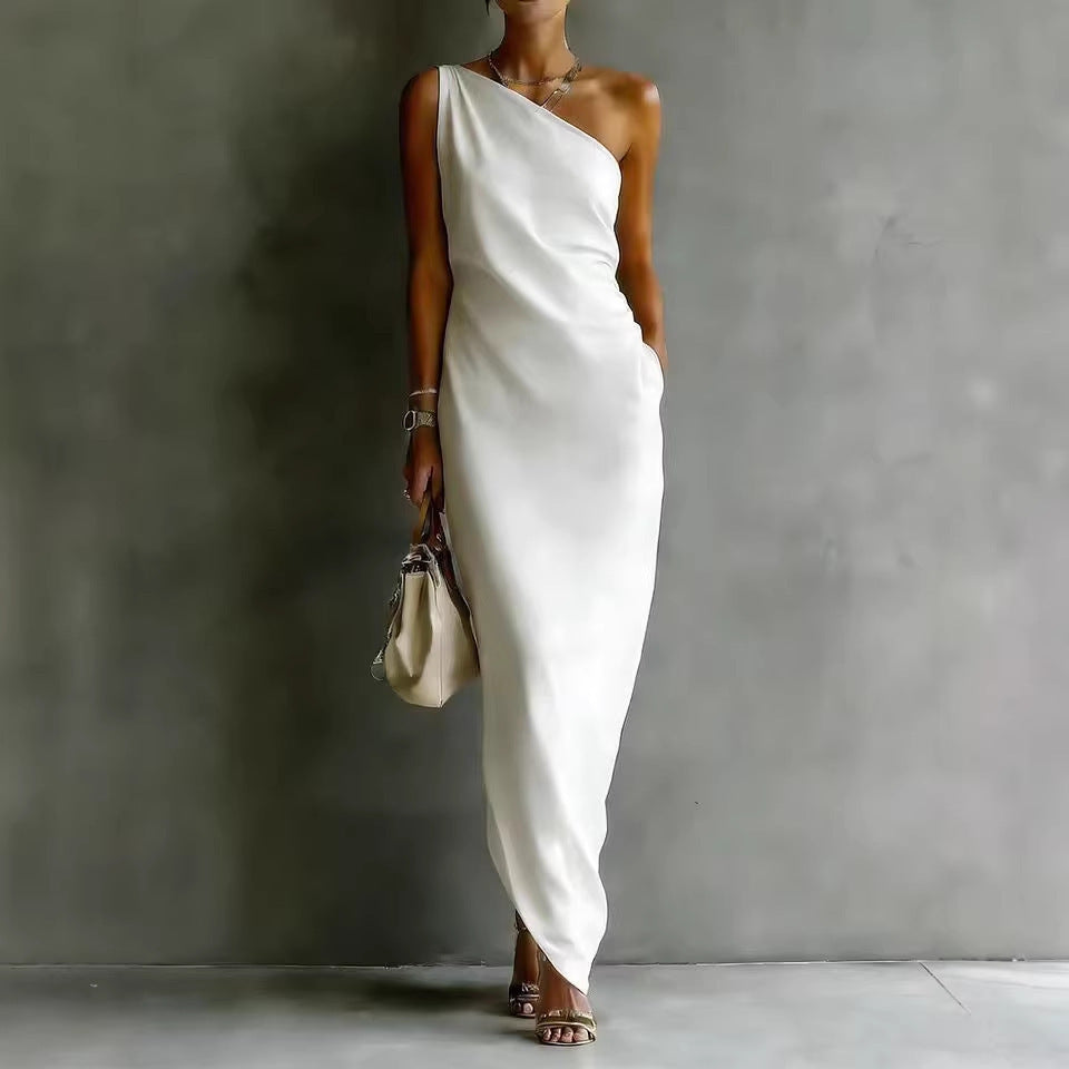 Women's satin off-shoulder slim-fit maxi dress by FitiqueFit, casualwear style, shown on a model with a flowing silhouette.