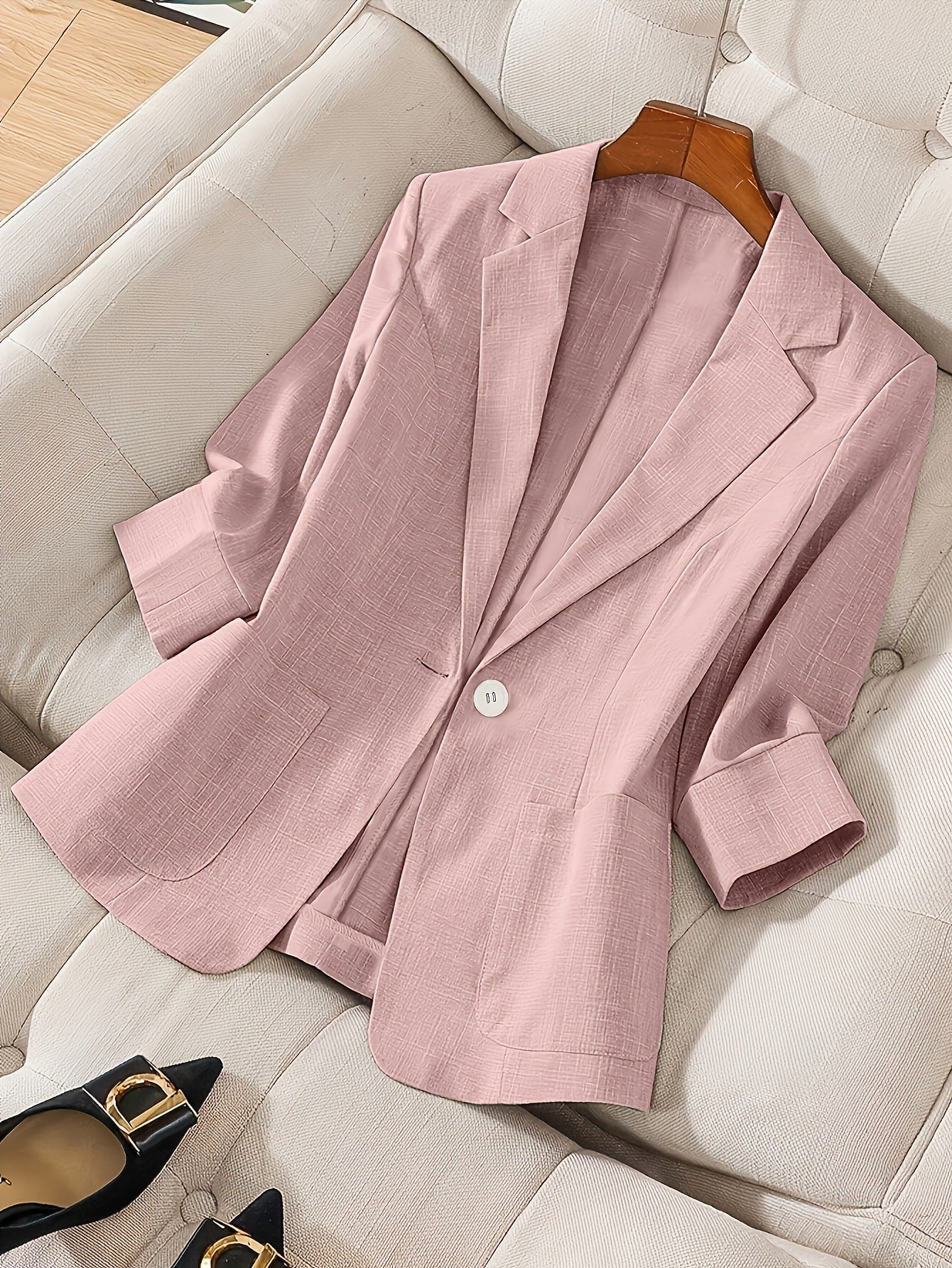 Women's casual blazer with three-quarter sleeves and single button from FitiqueFit, shown in a tailored, stylish fit.