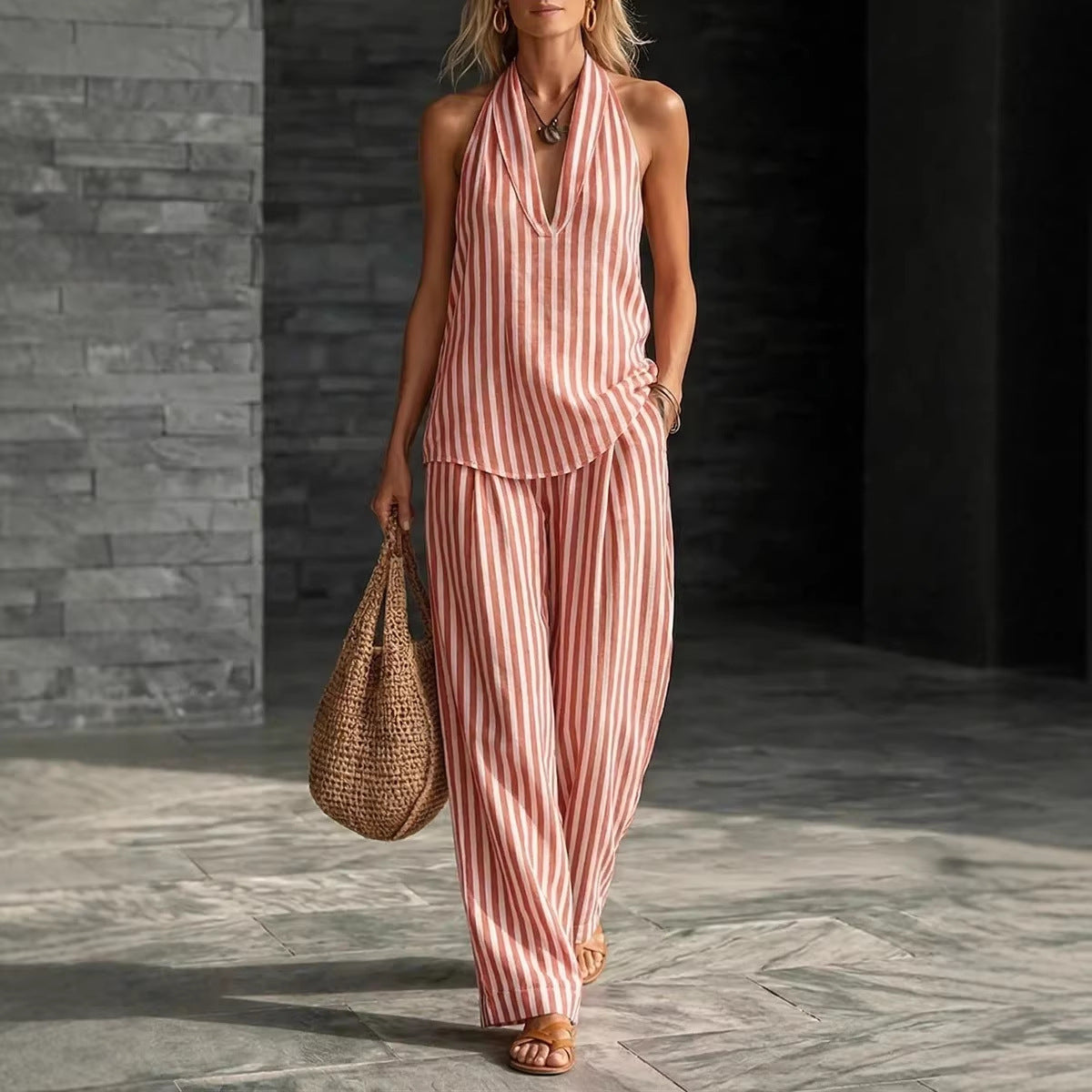 Women's striped sleeveless top and wide-leg pants set by FitiqueFit, casualwear outfit with a stylish, relaxed fit.