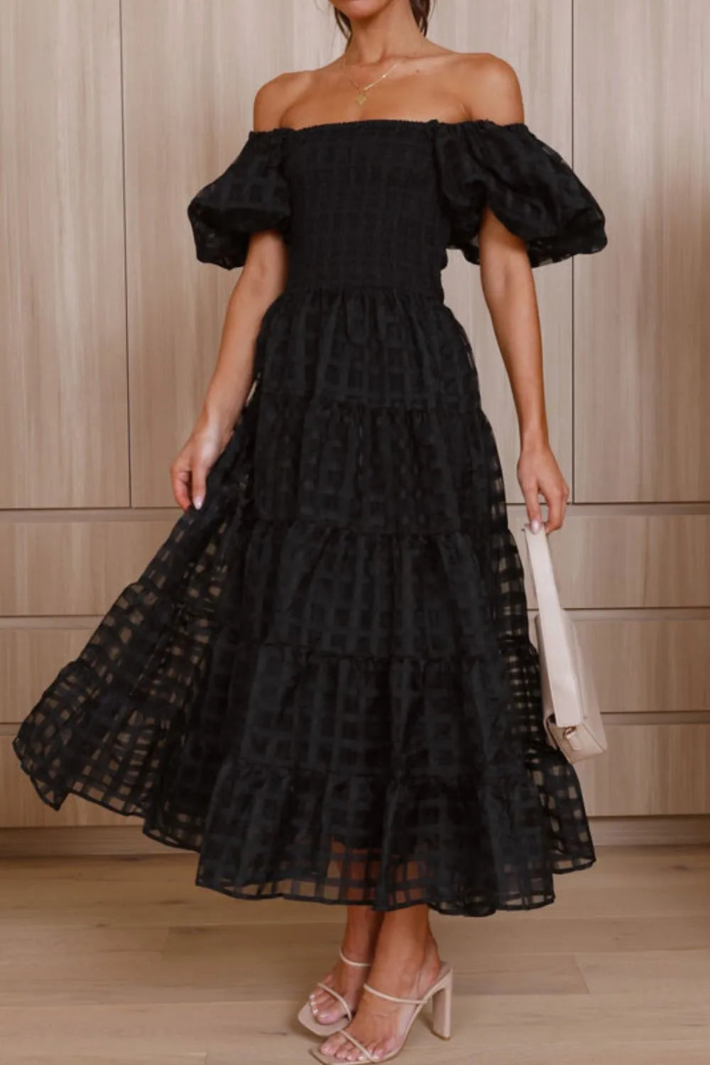 Off shoulder short puff sleeve midi dress by Shopiebay, featuring a feminine silhouette and stylish design.