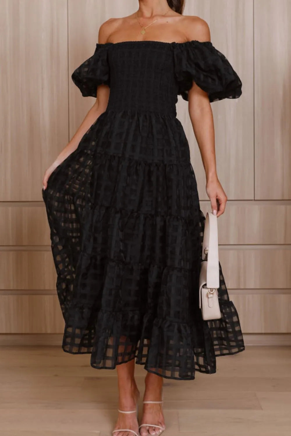 Off shoulder short puff sleeve midi dress by Shopiebay, featuring a stylish design with a fitted waist and soft fabric.