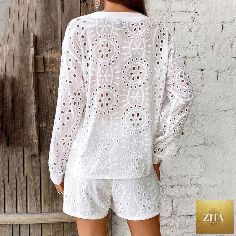 Women's eyelet embroidery V-neck long sleeve top and matching shorts two-piece set by MERIDGE, with floral details and comfortable fit.