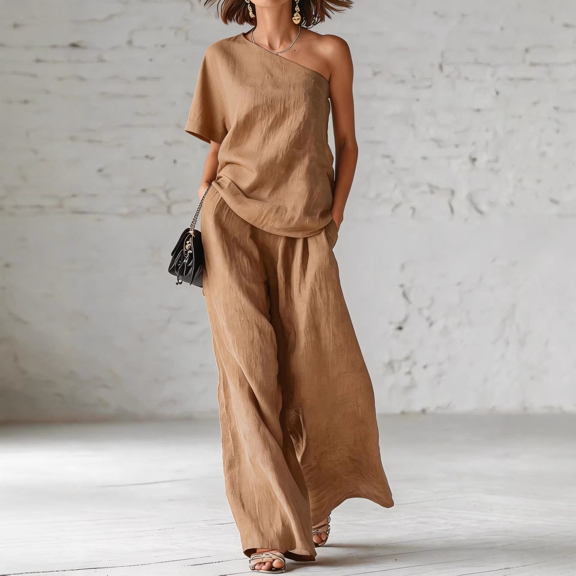 Women's wide-leg pants and top set by FitiqueFit, casualwear outfit with three-quarter sleeves and relaxed fit.