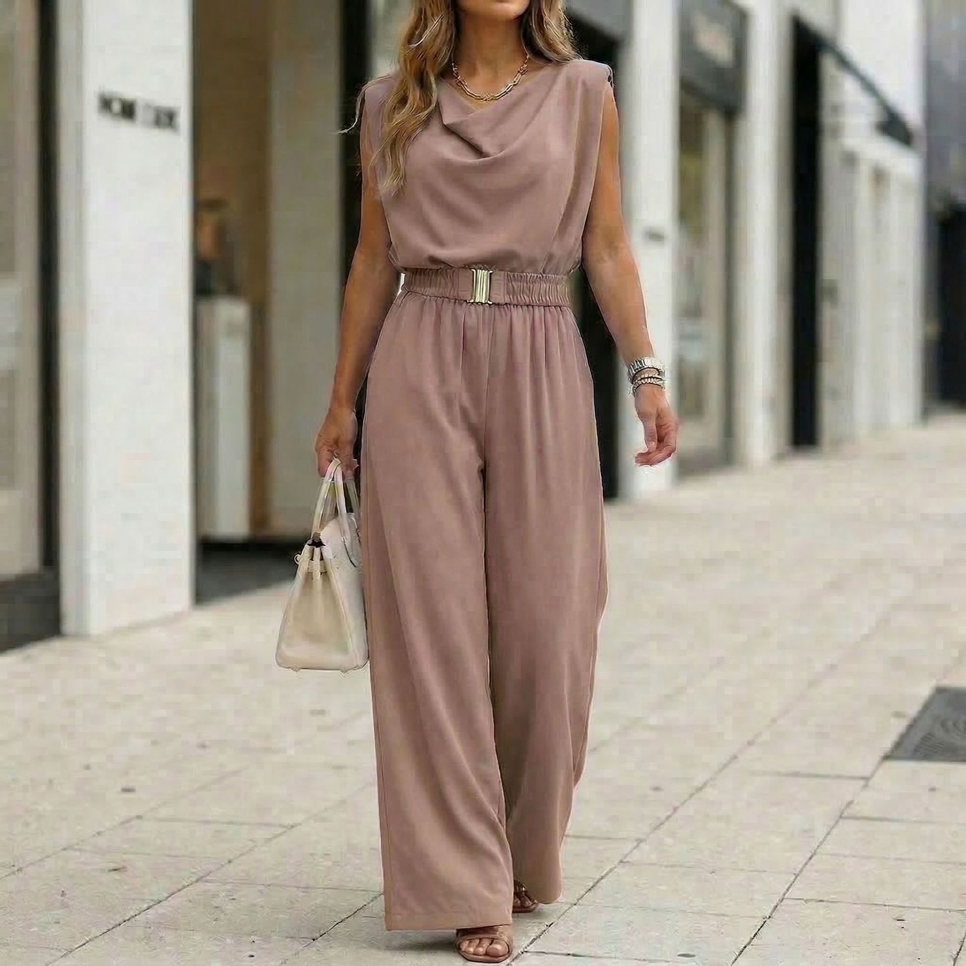 Women's off-shoulder sleeveless wide-leg jumpsuit with high waist and belt by FitiqueFit, shown on a model.