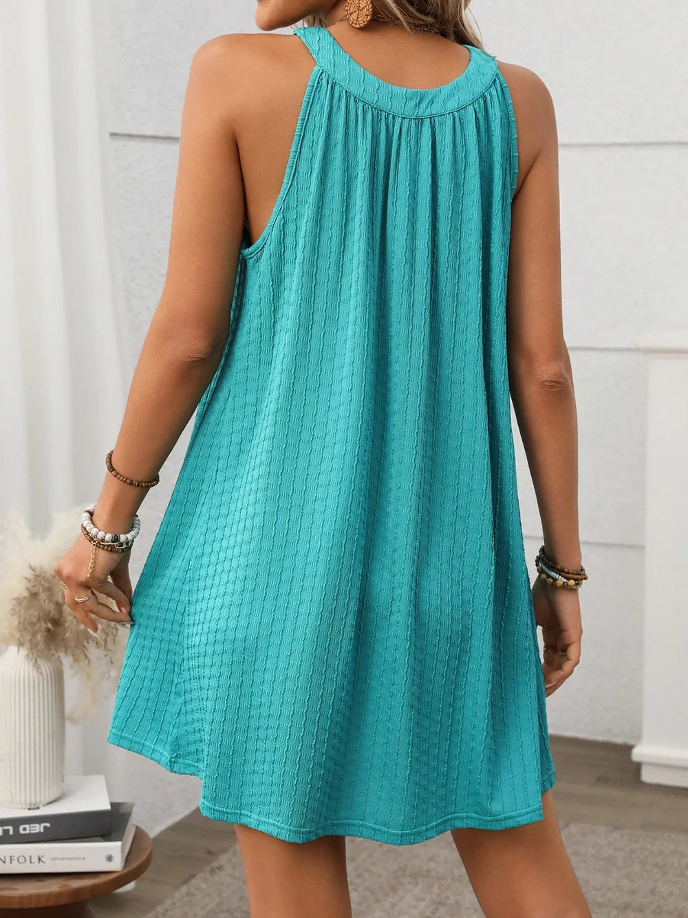 Textured Grecian Neck mini dress from Shopiebay featuring a fitted silhouette and elegant draped design, perfect for stylish occasions.