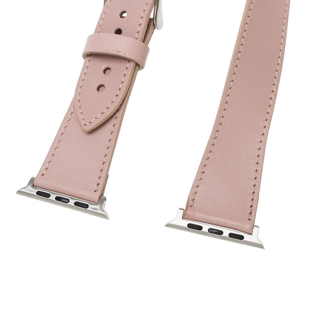 Luxury double wrap pink leather Apple Watch band by LEATHERE, featuring sleek design and secure clasp on a clean background.