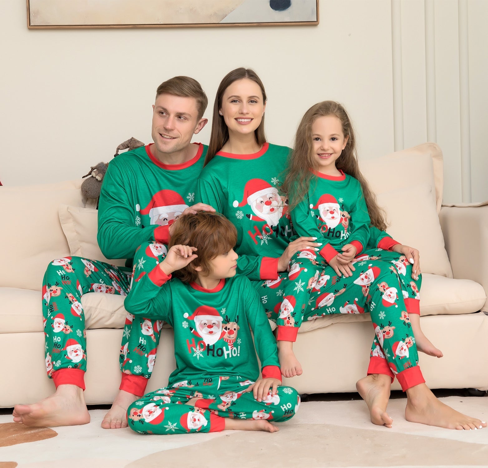 Family matching Christmas pajamas featuring Santa Claus print, cozy sleepwear for the holiday season by FitiqueFit.