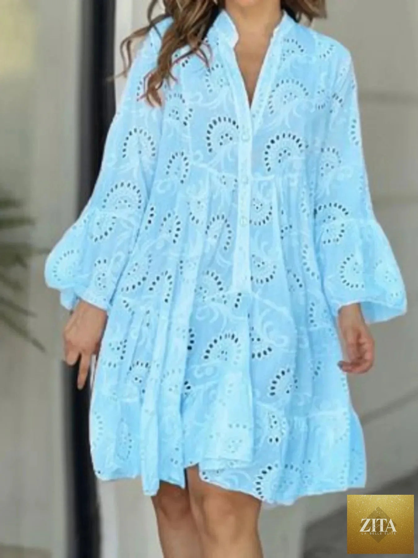Eyelet ruffled hem tiered dress from Shopiebay, featuring a flowy, feminine design with layered tiers and eyelet detailing.