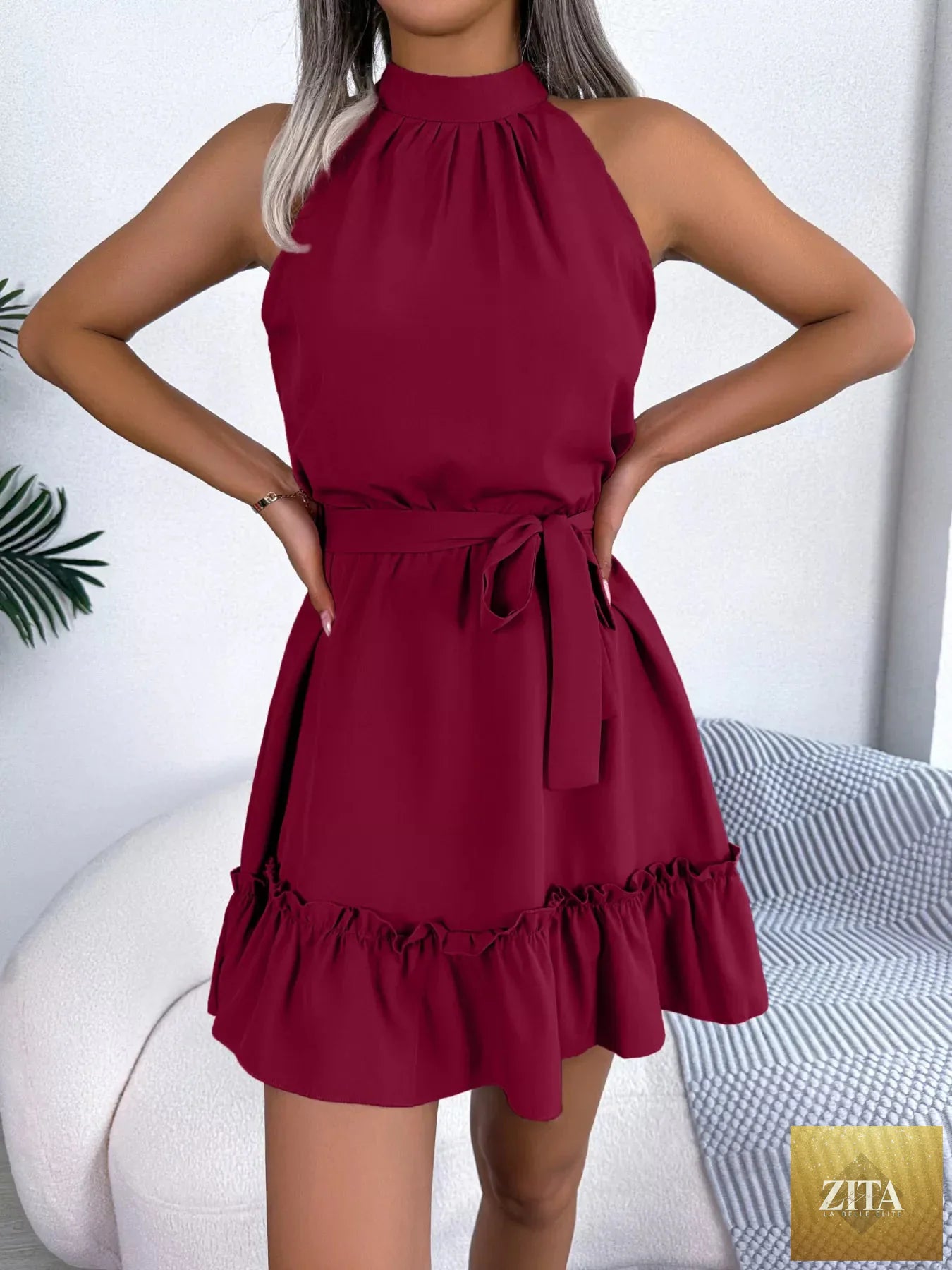 Halter neck ruffle hem A-line dress by Shopiebay featuring a stylish silhouette and flowy ruffle details.