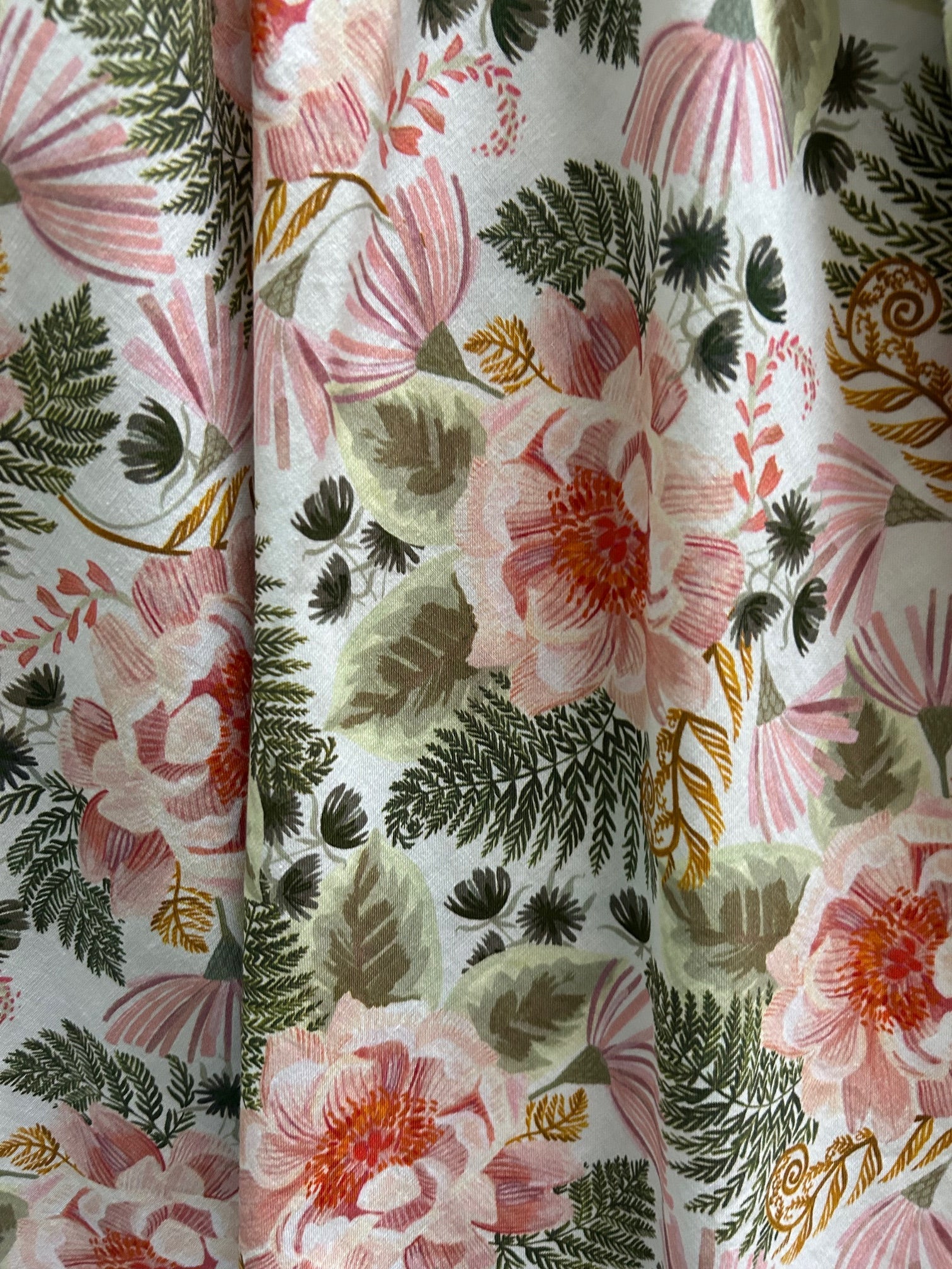 Pink floral Greta dress by Retrolicious, featuring a vintage-inspired design with a fitted bodice and flowing skirt.