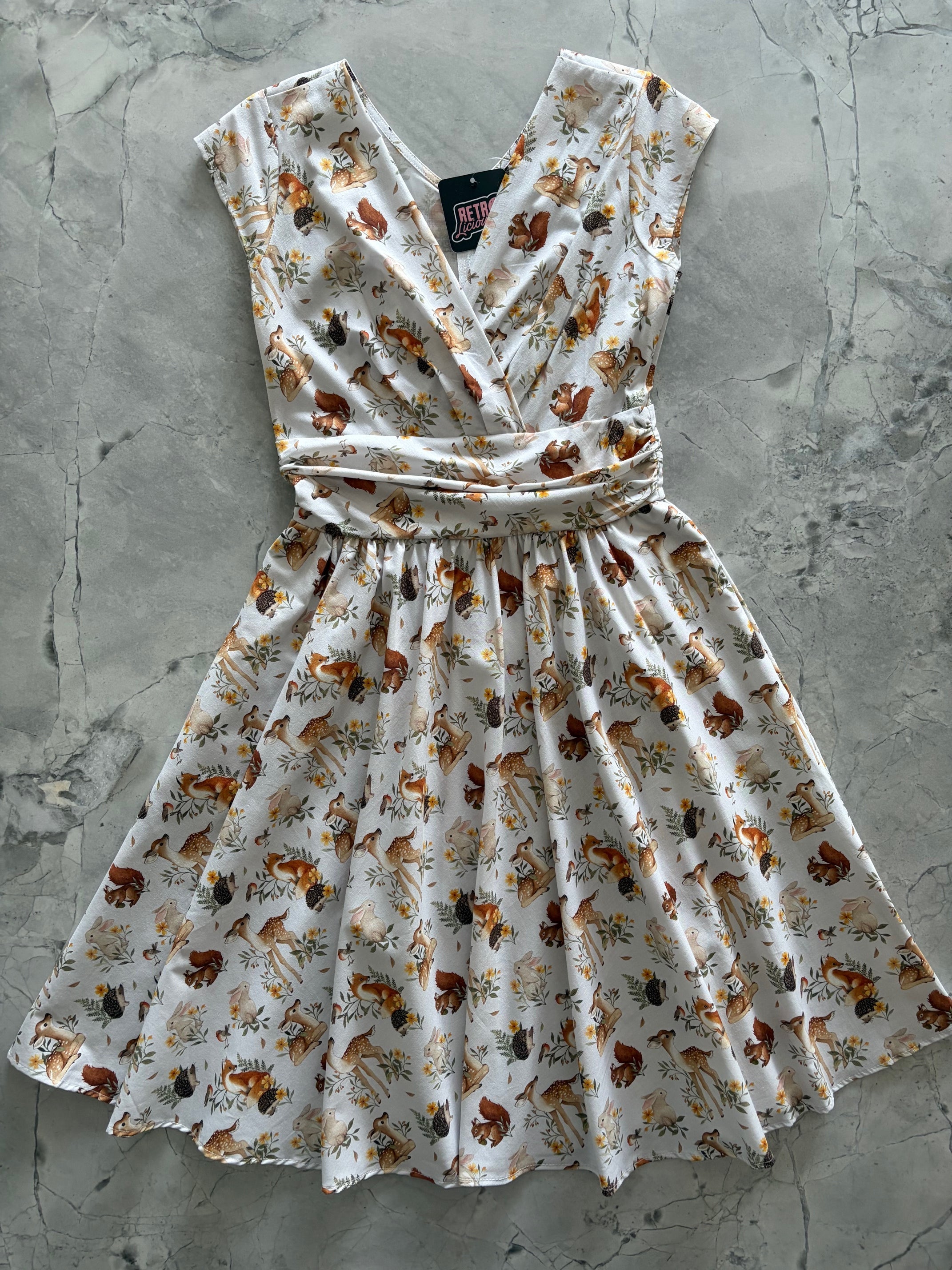 Retrolicious Woodland Animals Greta Dress featuring a colorful woodland animal print and a vintage-inspired design.