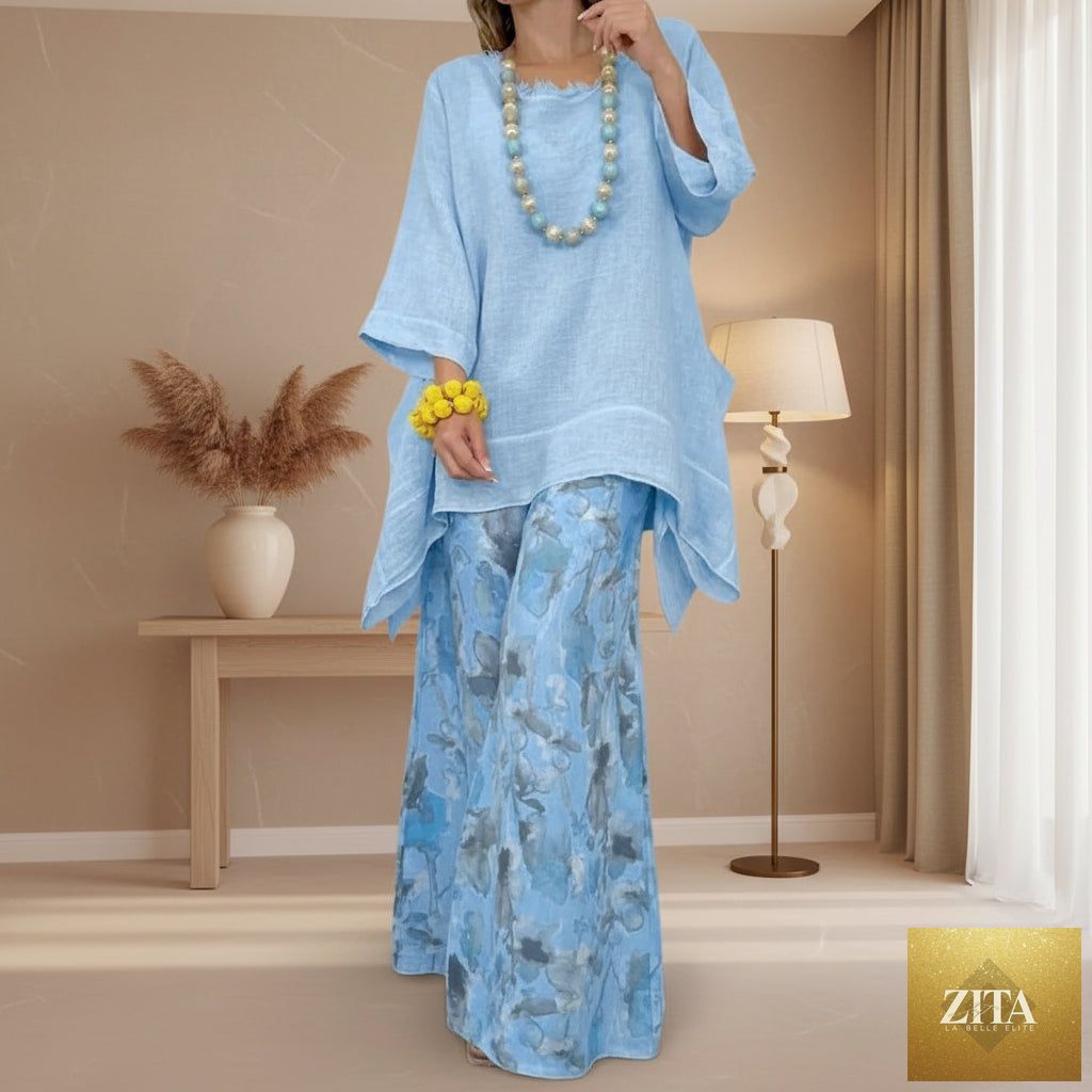 Women's linen-style tunic top and watercolor floral wide-leg pants set by MERIDGE, featuring a relaxed fit and vibrant floral design.