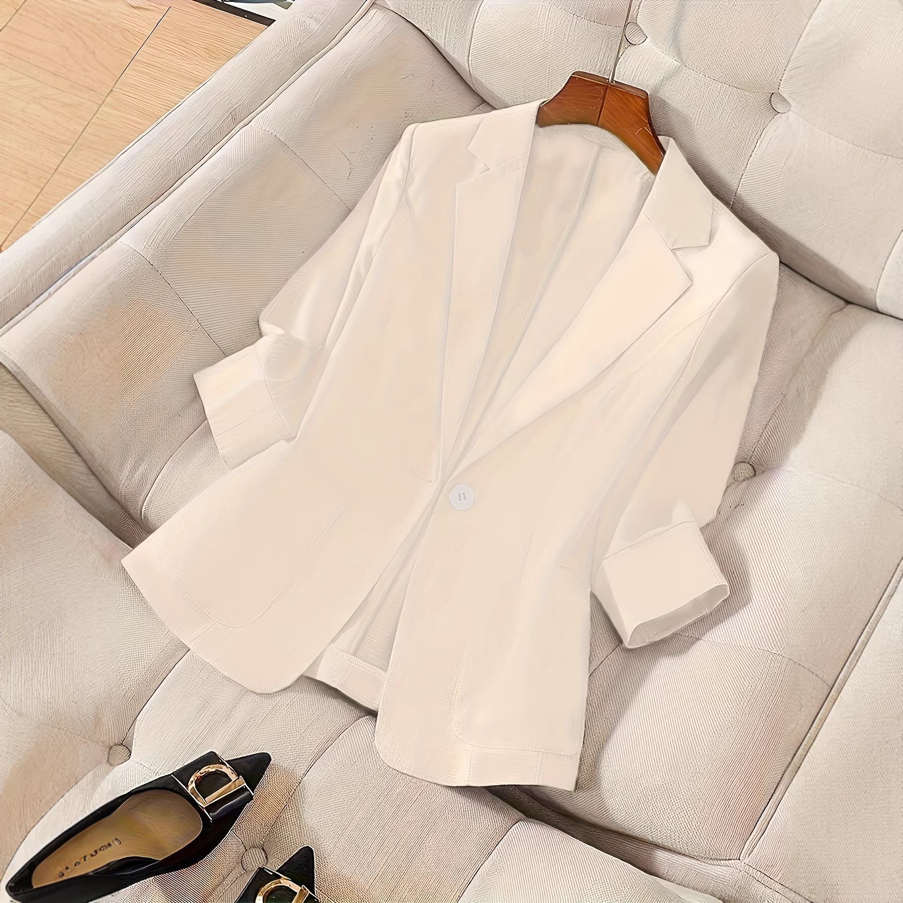 Women's casual blazer with three-quarter sleeves and a single button from FitiqueFit, shown in a tailored fit and neutral color.