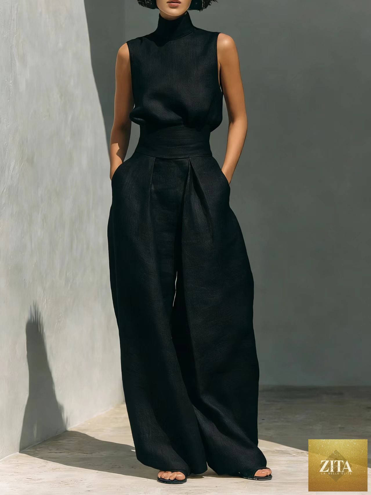 Women's linen-blend high-neck sleeveless top and wide-leg pants set by MERIDGE, shown on a model in a casual pose.