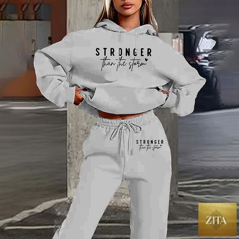 Women's solid 2-piece hoodie set by FitiqueFit featuring letter print, front pocket, and casual comfort.