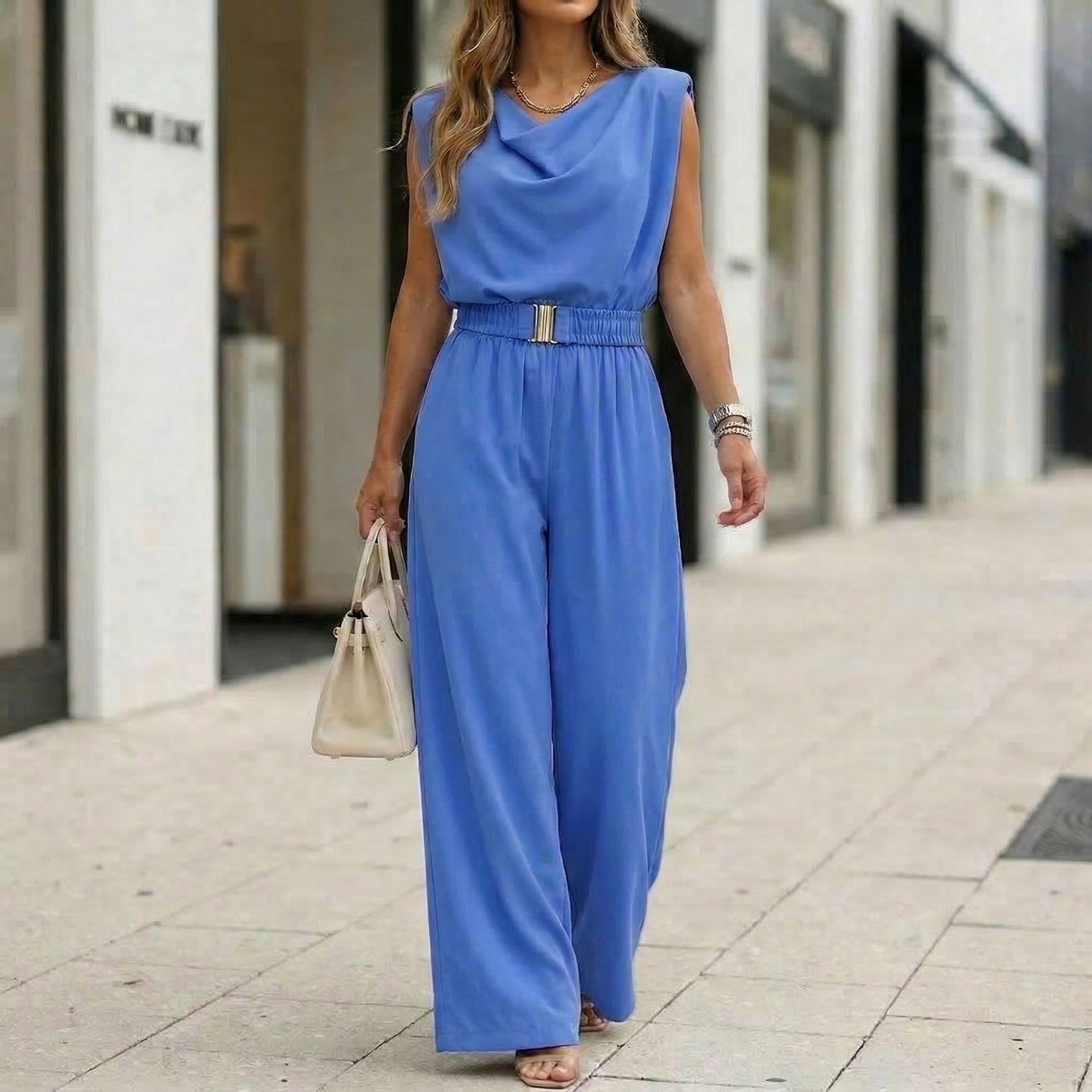 Women's off-shoulder sleeveless wide-leg jumpsuit with high waist and belt, casualwear from FitiqueFit, shown on a model.