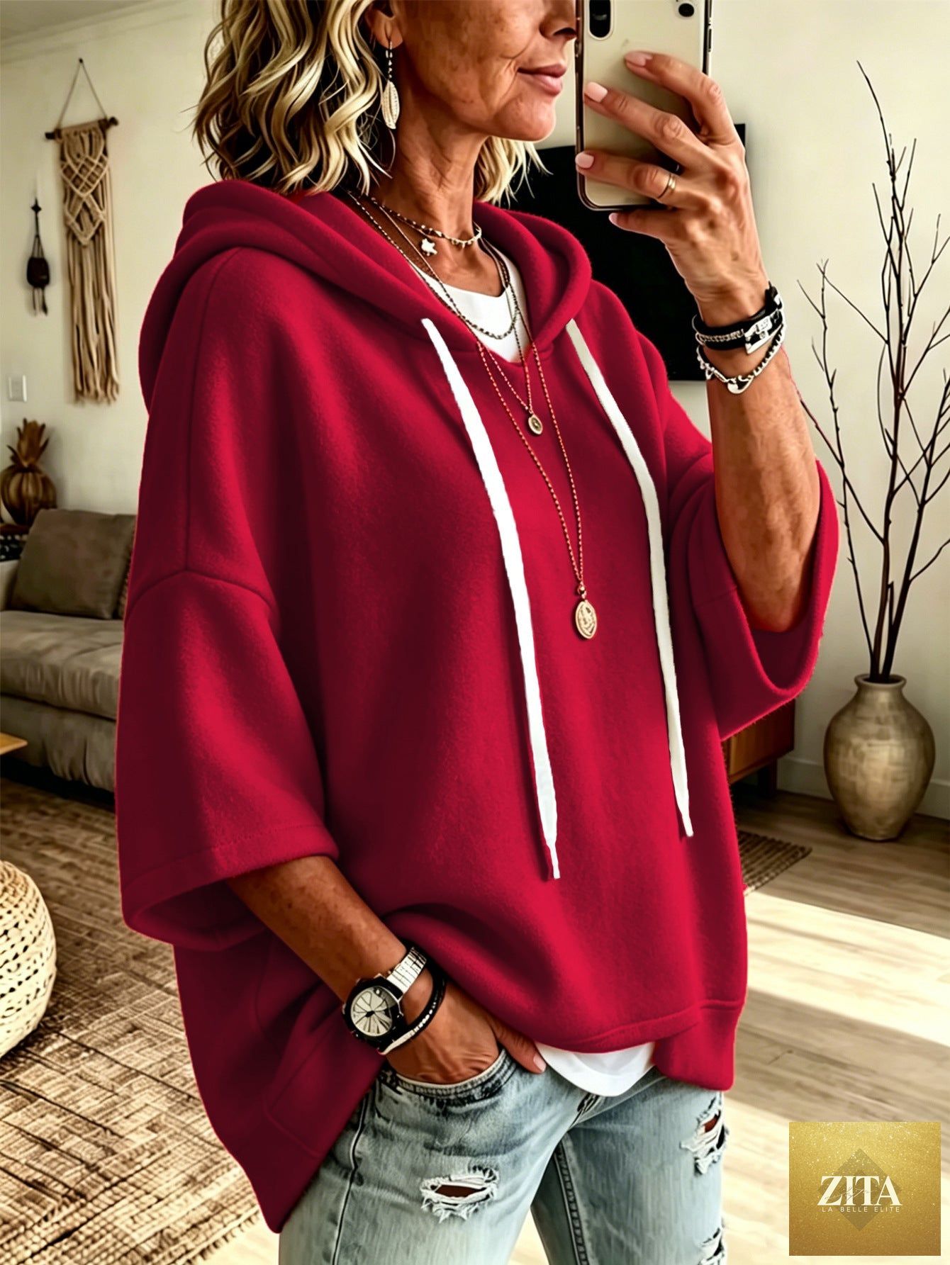 Women's oversized batwing sleeve hoodie by FitiqueFit, loose fleece pullover with relaxed fit and cozy design.
