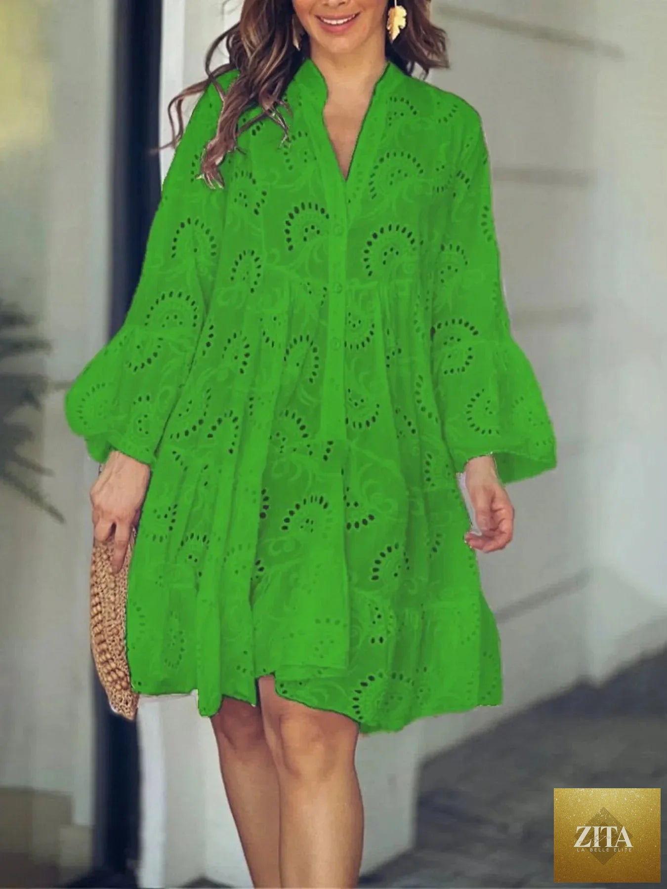 Eyelet ruffled hem tiered dress from Shopiebay featuring a feminine design with layered fabric and eyelet detailing.