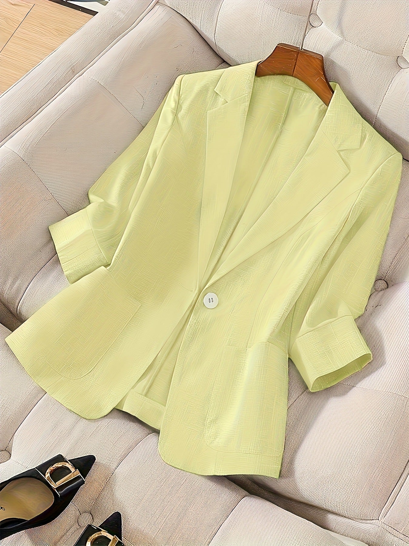 Women's casual blazer with three-quarter sleeves and a single button, stylish FitiqueFit coat for versatile wear.