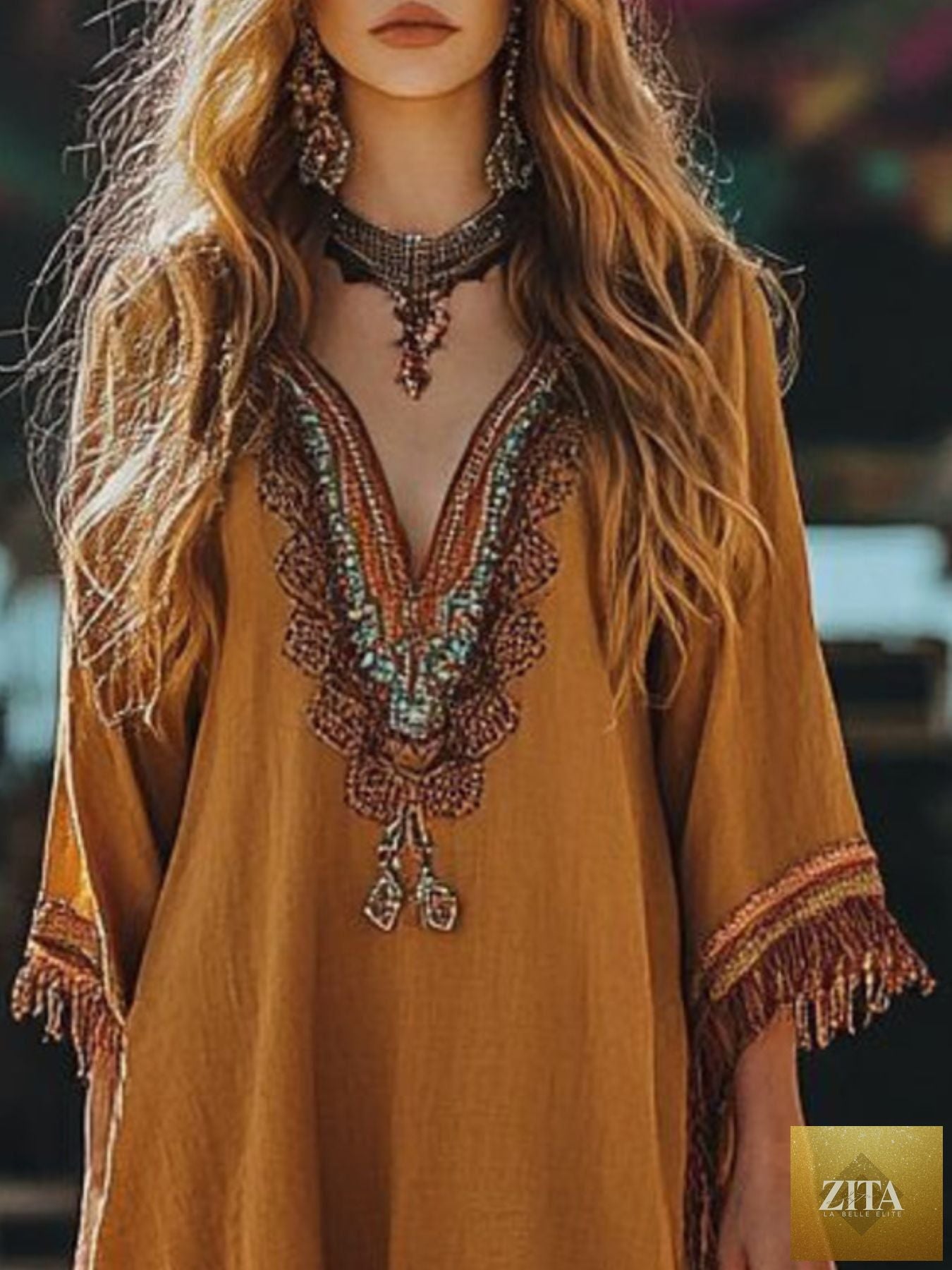Shopiebay fringe hem mini dress with 3/4 sleeves, featuring a stylish design and a chic hemline, perfect for casual or dressy occasions.
