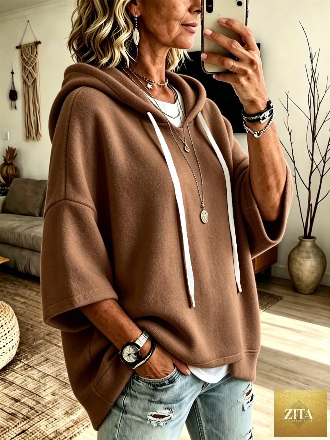 Women's oversized batwing sleeve hoodie by FitiqueFit featuring a loose fleece pullover with relaxed fit and cozy style.
