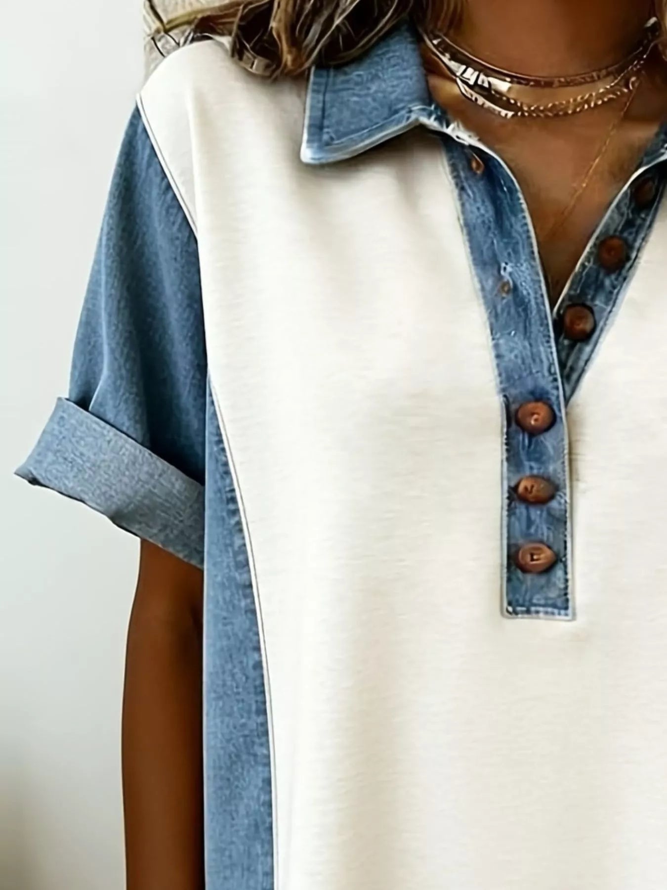 Denim patchwork button-front mini dress by Shopiebay featuring a fitted silhouette and stylish patchwork details.