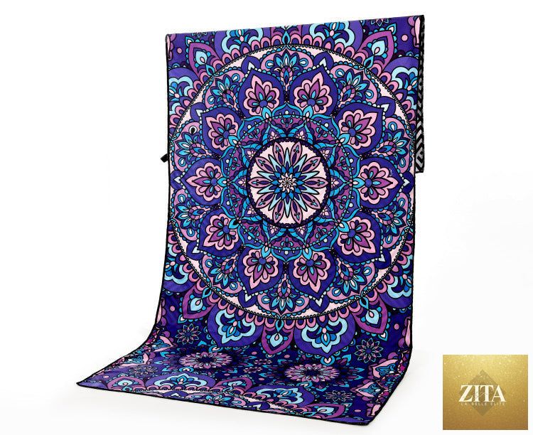 Colorful outdoor travel and beach towel with striped pattern, made of soft, absorbent fabric for sports and beach use.